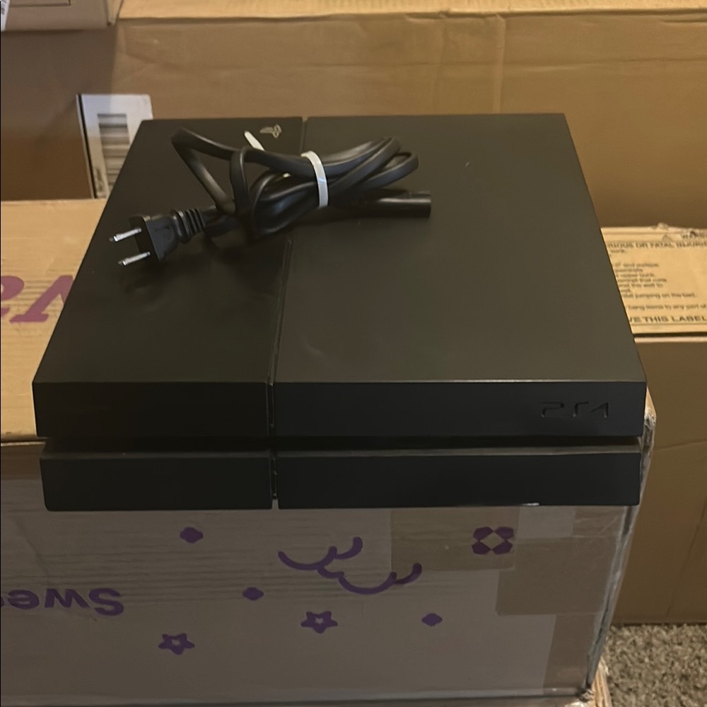 Black PS4 Console with Power Cord